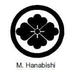 A black and white picture of the seal of m. Hanabishi