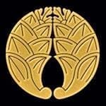 A gold colored logo of an animal 's head.